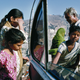 Raghubir Singh. Vendor and Clients, Bundi, Rajasthan, 1997.